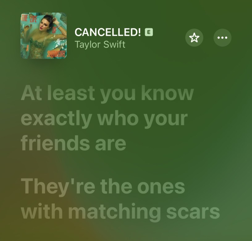 Screenshot from Apple Music for Cancelled! by Taylor Swift. Displayed lyrics: "At least you know who your friends are They're the ones with matching scars."